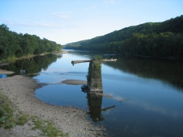 over the Delaware River. the log is on an old bridge support and got there during a flood which placed it up upon the structure